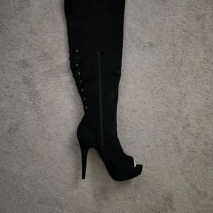 Knee high lace up boots